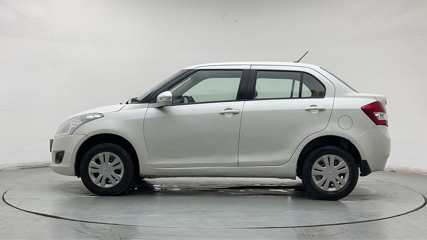 Used 2014 Maruti Suzuki Swift Dzire VXI Petrol Manual exterior LEFT SIDE VIEW