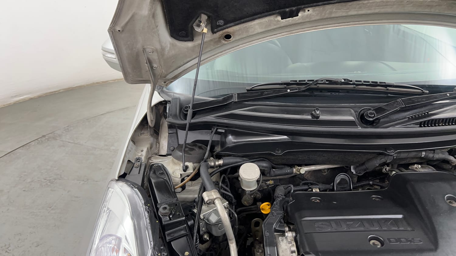 Used 2012 Maruti Suzuki Swift ZDi Diesel Manual engine ENGINE RIGHT SIDE HINGE & APRON VIEW