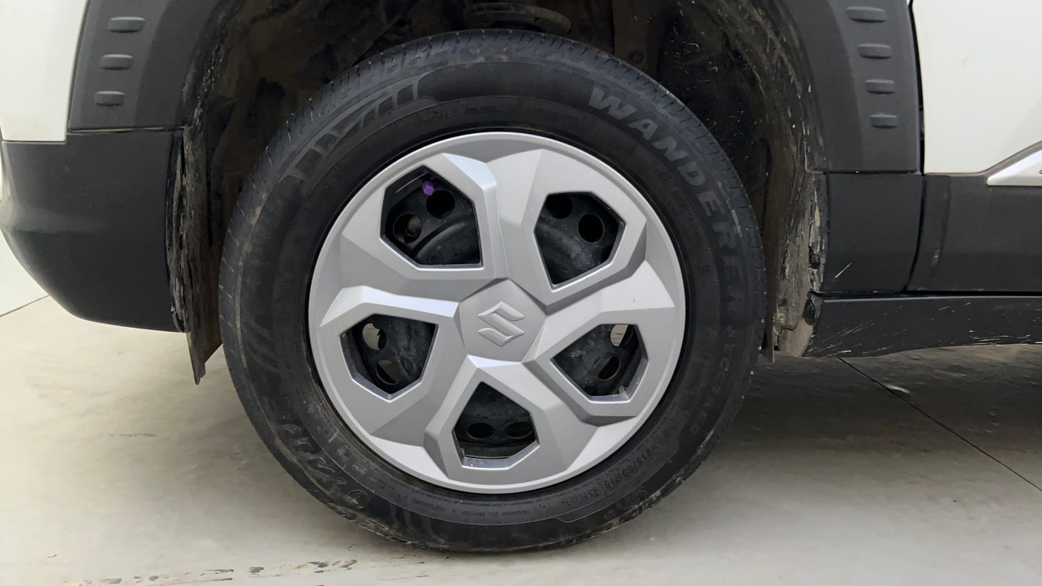 Used 2024 Maruti Suzuki Brezza VXi Petrol Manual tyres LEFT FRONT TYRE RIM VIEW