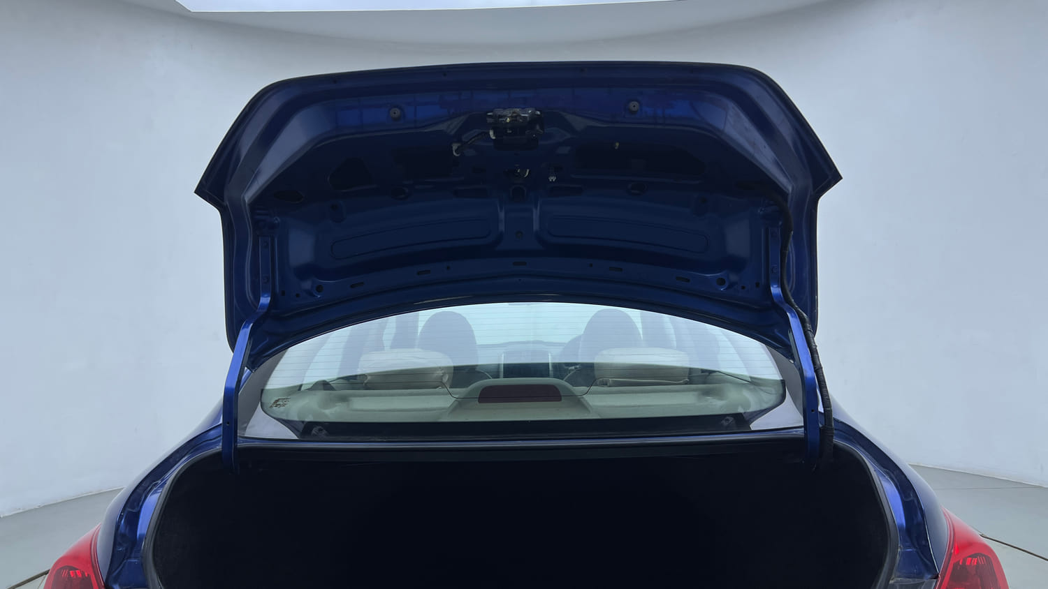 Used 2013 Nissan Sunny XL Petrol Manual interior DICKY DOOR OPEN VIEW
