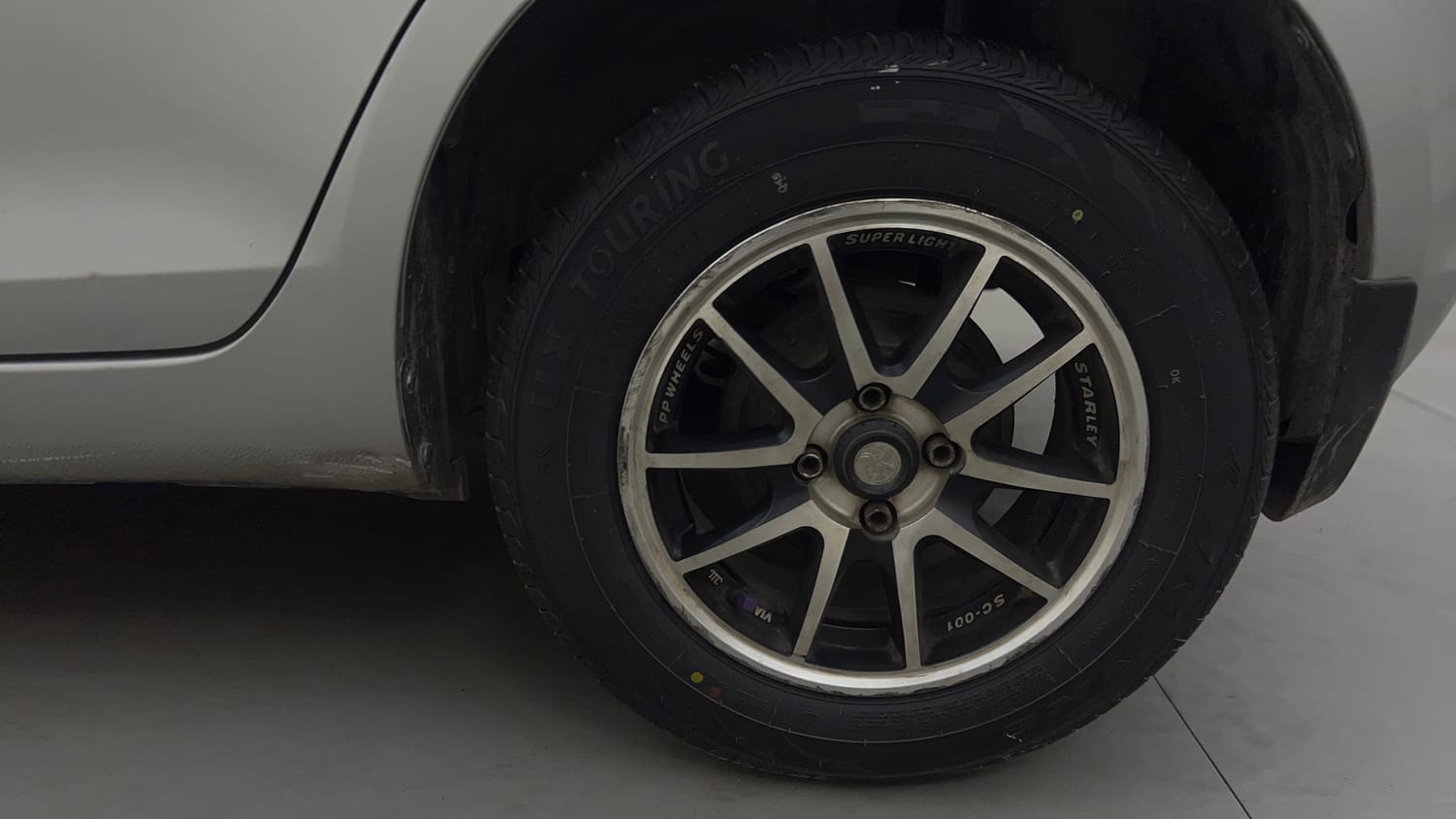 Used 2012 Maruti Suzuki Swift VXi Petrol Manual tyres LEFT REAR TYRE RIM VIEW
