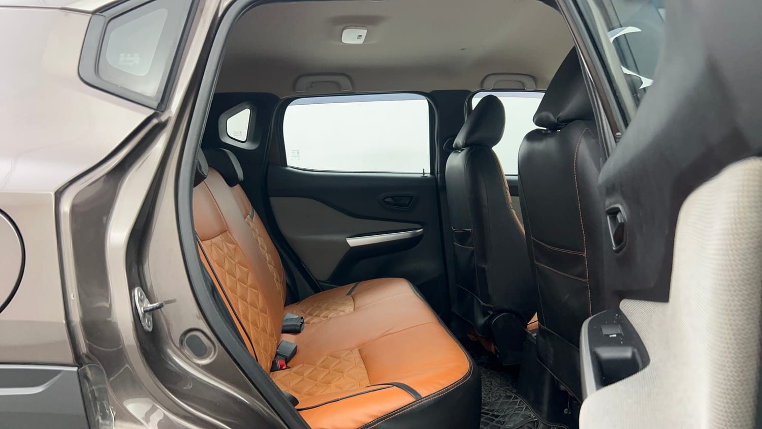 Used 2023 Nissan Magnite XE Petrol Manual interior RIGHT SIDE REAR DOOR CABIN VIEW
