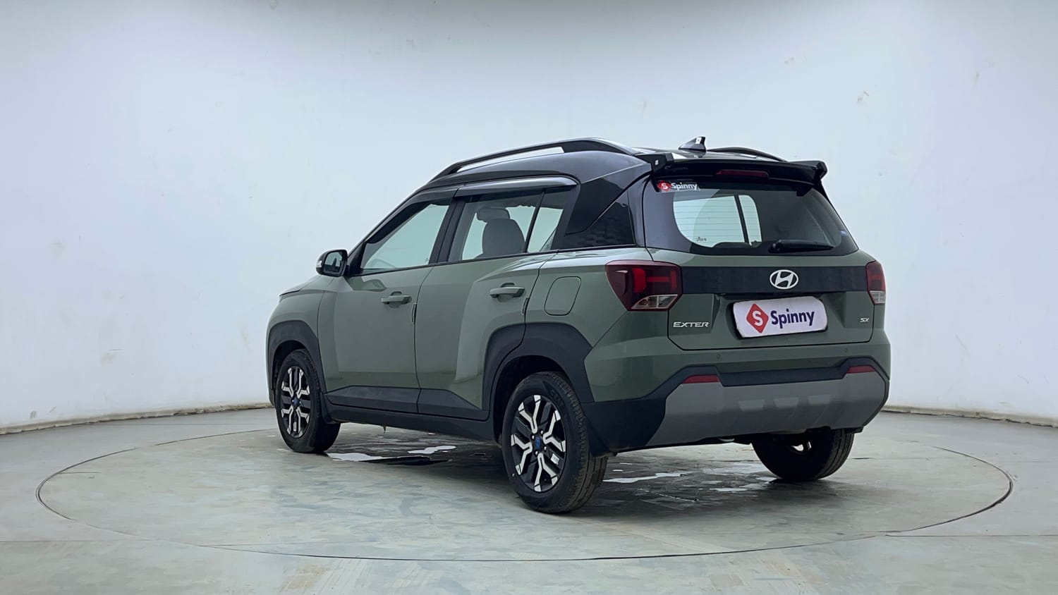 Used 2025 Hyundai Exter SX (O) Connect 1.2 AMT Dual Tone Petrol Automatic exterior LEFT REAR CORNER VIEW