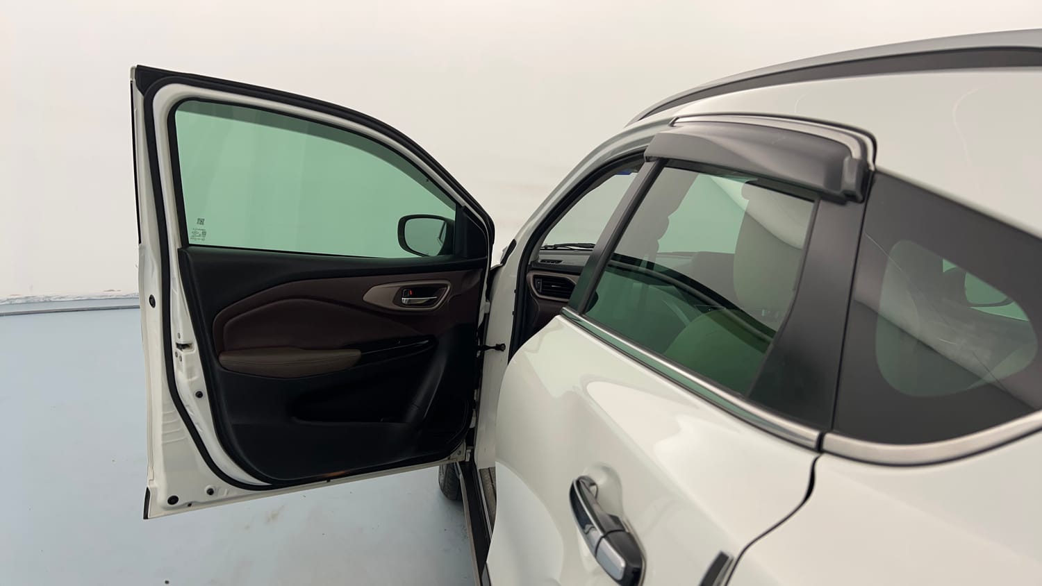 Used 2025 Maruti Suzuki Fronx Zeta 1.0L Turbo MT Petrol Manual interior LEFT FRONT DOOR OPEN VIEW