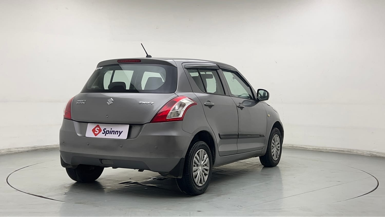 Used 2017 Maruti Suzuki Swift Lxi (O) Petrol Manual exterior RIGHT REAR CORNER VIEW