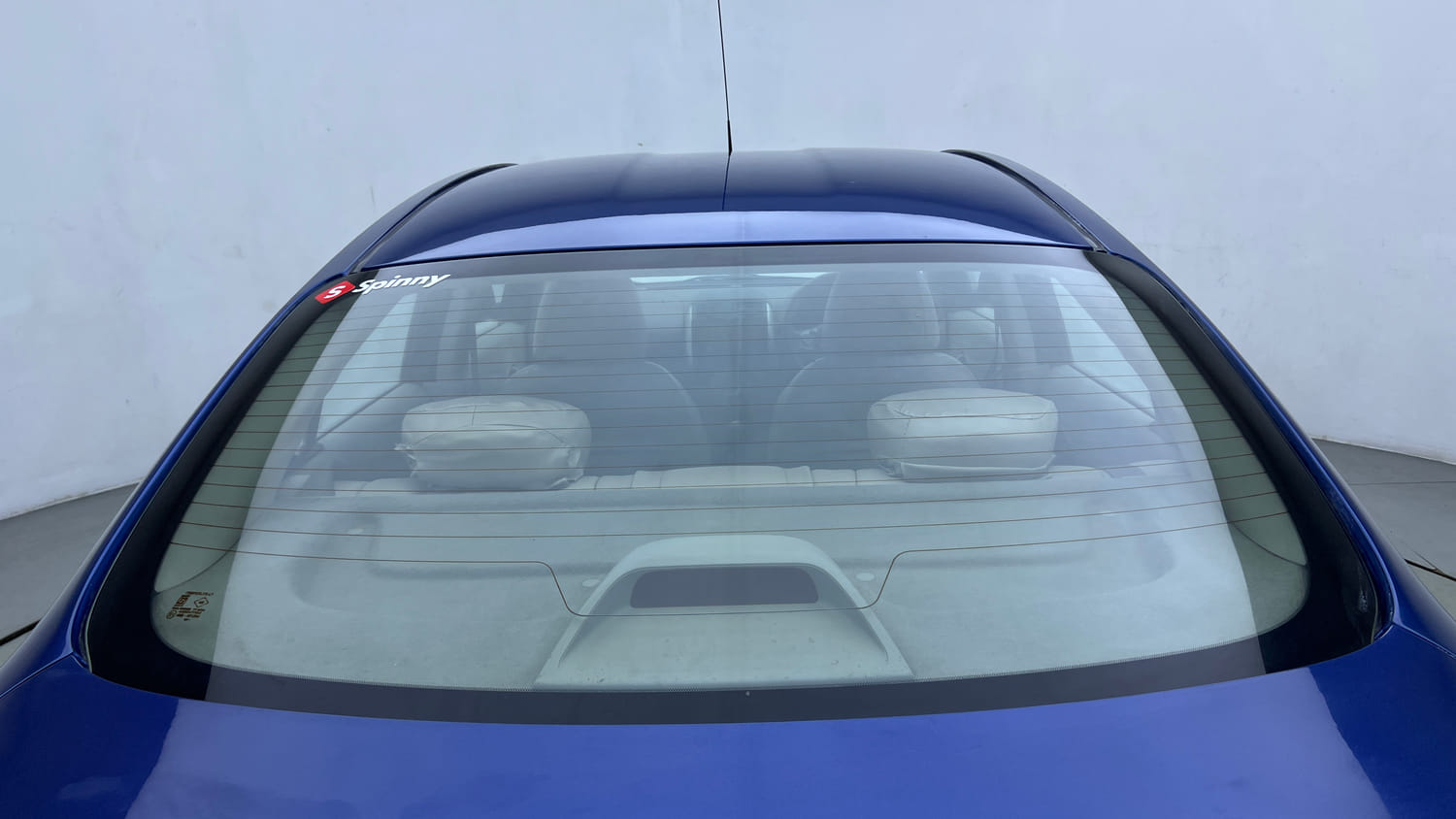 Used 2013 Nissan Sunny XL Petrol Manual exterior BACK WINDSHIELD VIEW