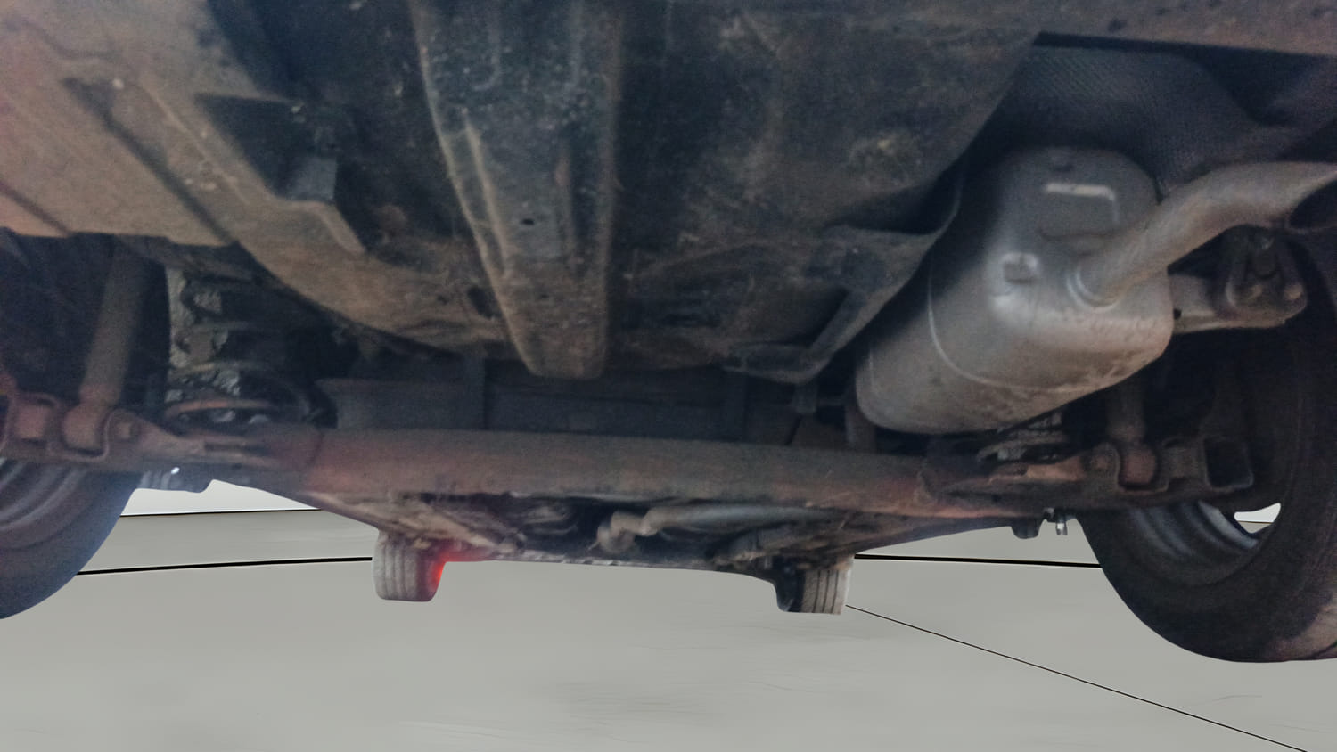 Used 2024 Hyundai Aura S 1.2 Petrol Petrol Manual extra REAR UNDERBODY VIEW (TAKEN FROM REAR)