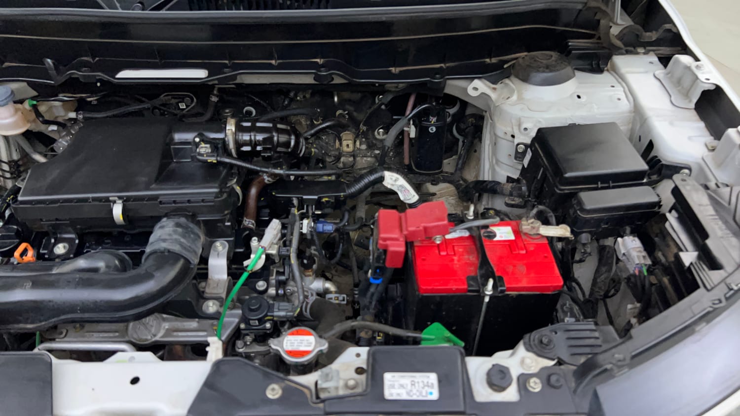 Used 2024 Maruti Suzuki Brezza VXi Petrol Manual engine ENGINE LEFT SIDE VIEW