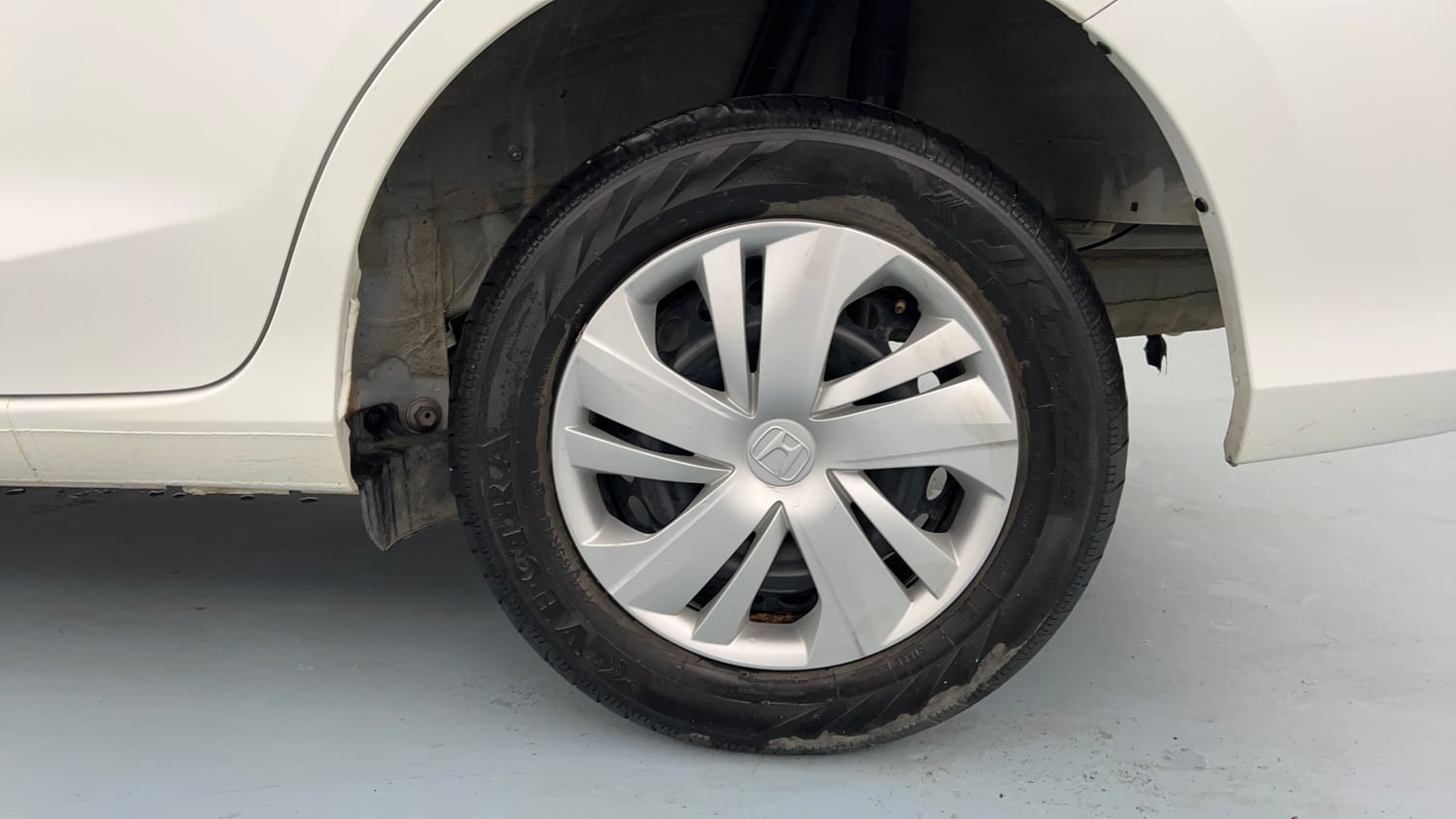 Used 2022 Honda Amaze S MT 1.2 Petrol Petrol Manual tyres LEFT REAR TYRE RIM VIEW