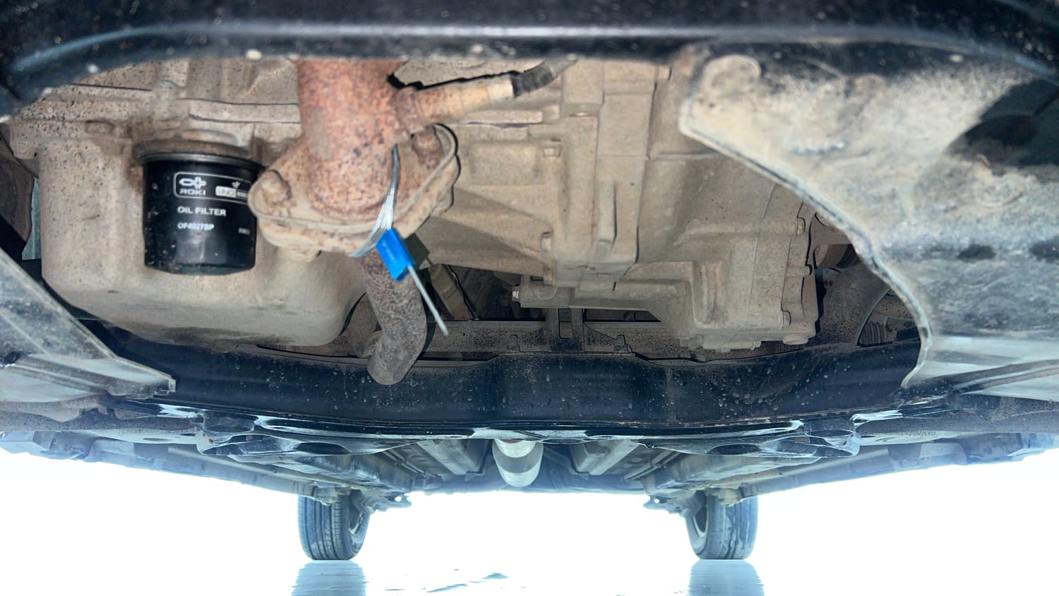 Used 2017 Maruti Suzuki Swift Lxi (O) Petrol Manual extra FRONT LEFT UNDERBODY VIEW