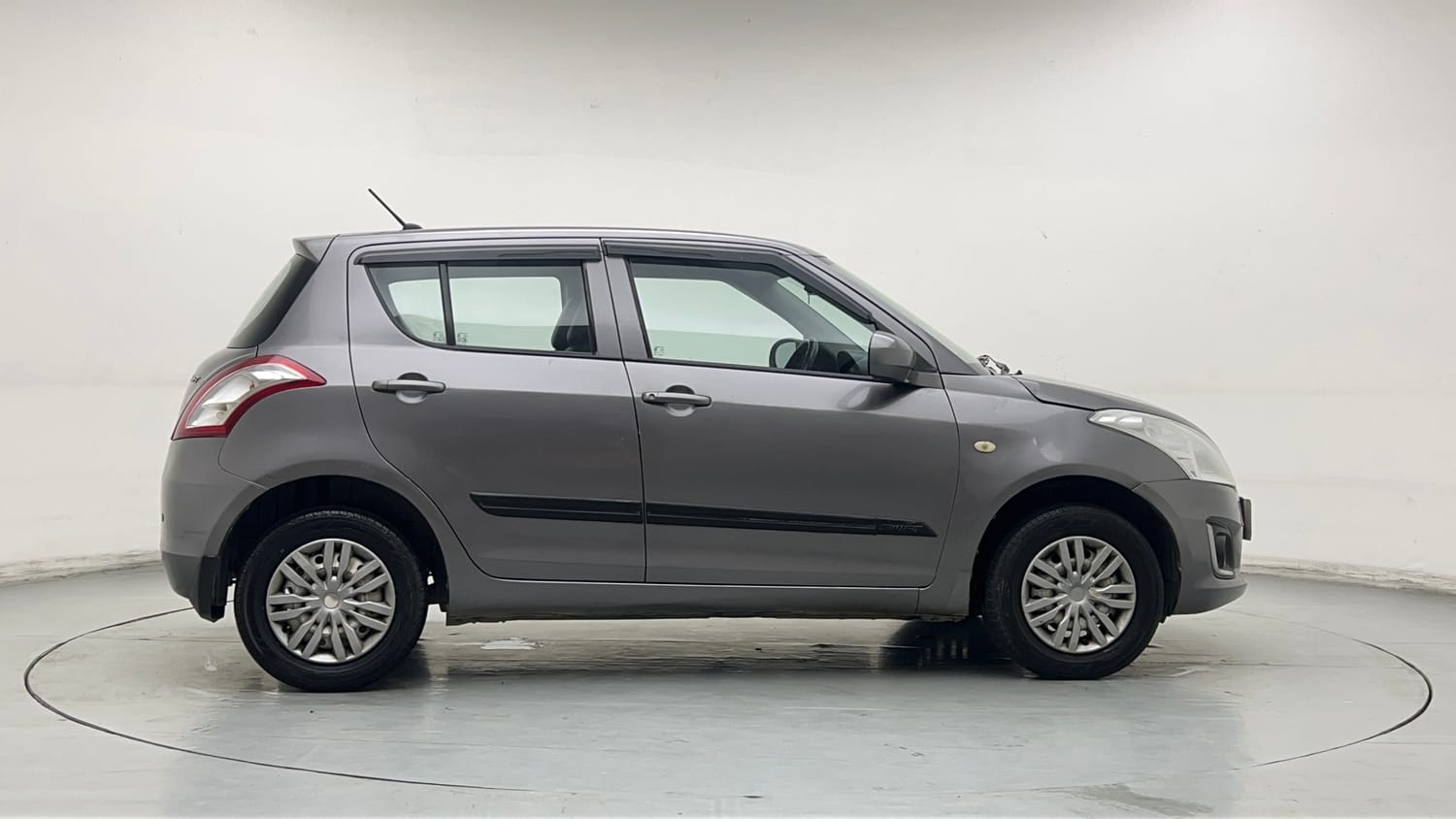 Used 2017 Maruti Suzuki Swift Lxi (O) Petrol Manual exterior RIGHT SIDE VIEW