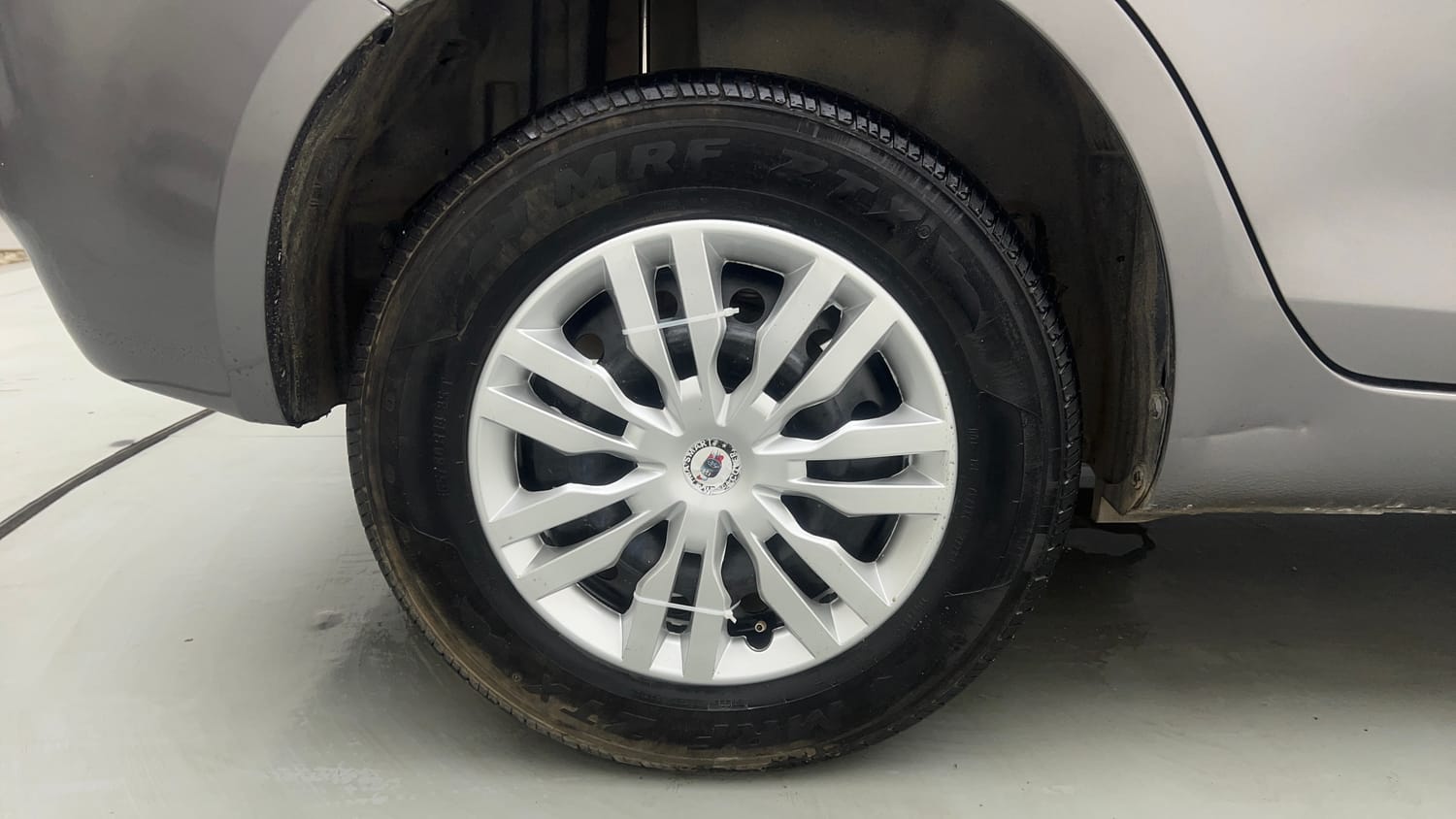 Used 2013 Maruti Suzuki Swift Dzire VXI Petrol Manual tyres RIGHT REAR TYRE RIM VIEW