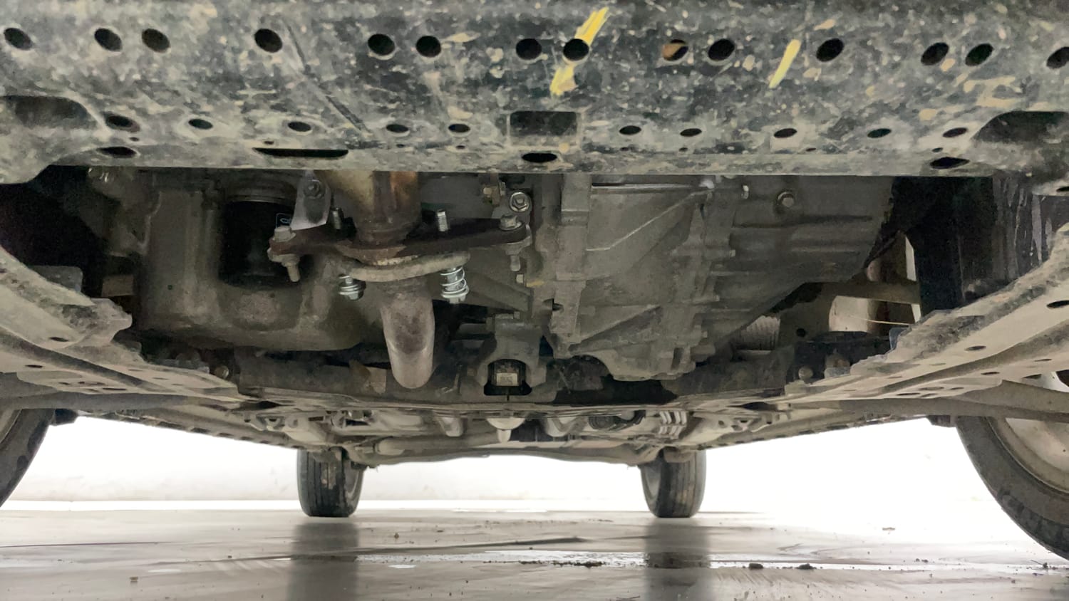 Used 2022 Maruti Suzuki XL6 Zeta MT Petrol Petrol Manual extra FRONT LEFT UNDERBODY VIEW