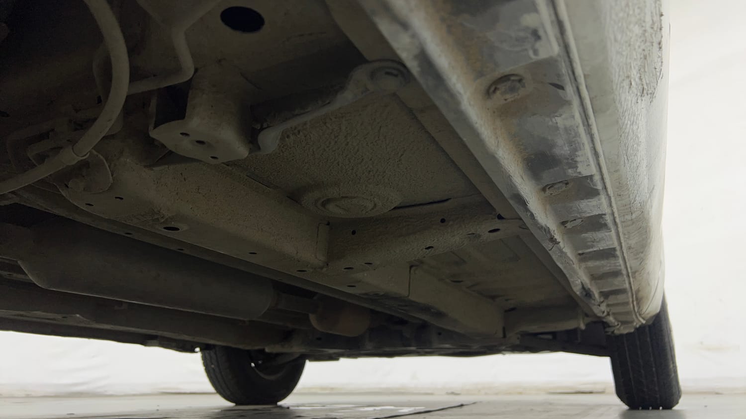 Used 2014 Maruti Suzuki Swift Dzire VXI Petrol Manual extra REAR RIGHT UNDERBODY VIEW