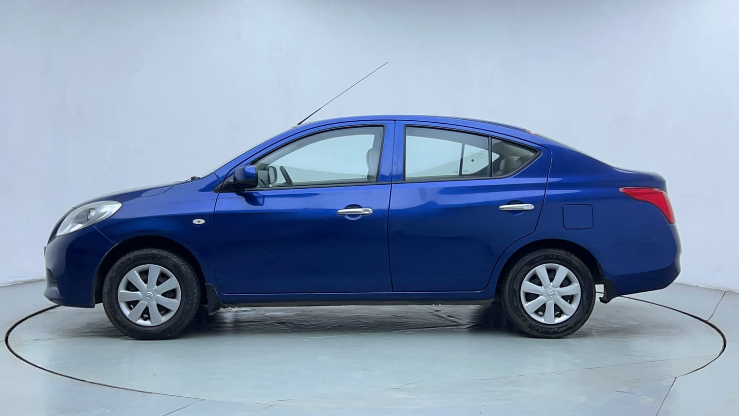 Used 2013 Nissan Sunny XL Petrol Manual exterior LEFT SIDE VIEW