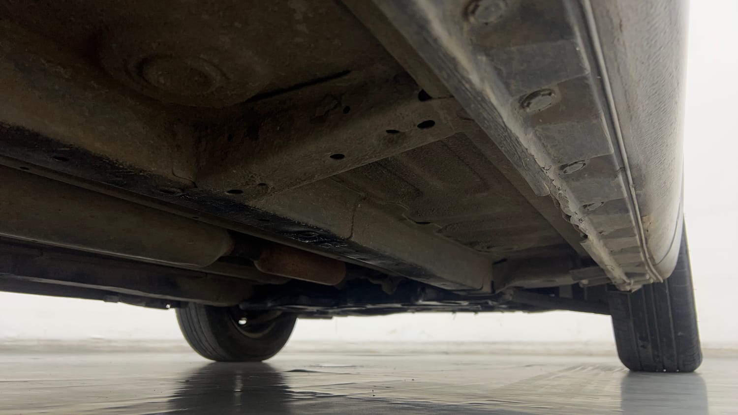 Used 2017 Maruti Suzuki Swift Lxi (O) Petrol Manual extra REAR RIGHT UNDERBODY VIEW