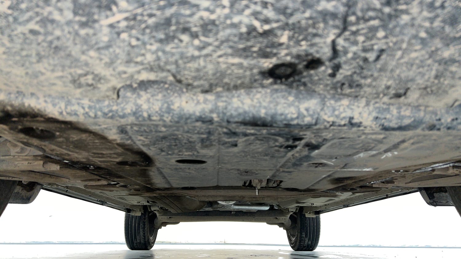 Used 2021 Nissan Kicks XV 1.5 Petrol Manual extra FRONT LEFT UNDERBODY VIEW