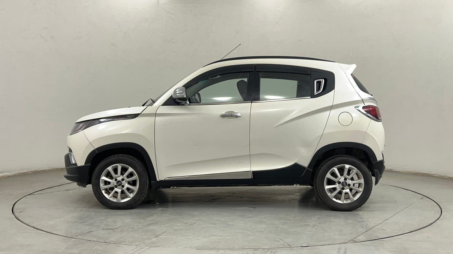 Used 2017 Mahindra KUV100 K8 6 STR Petrol Manual exterior LEFT SIDE VIEW