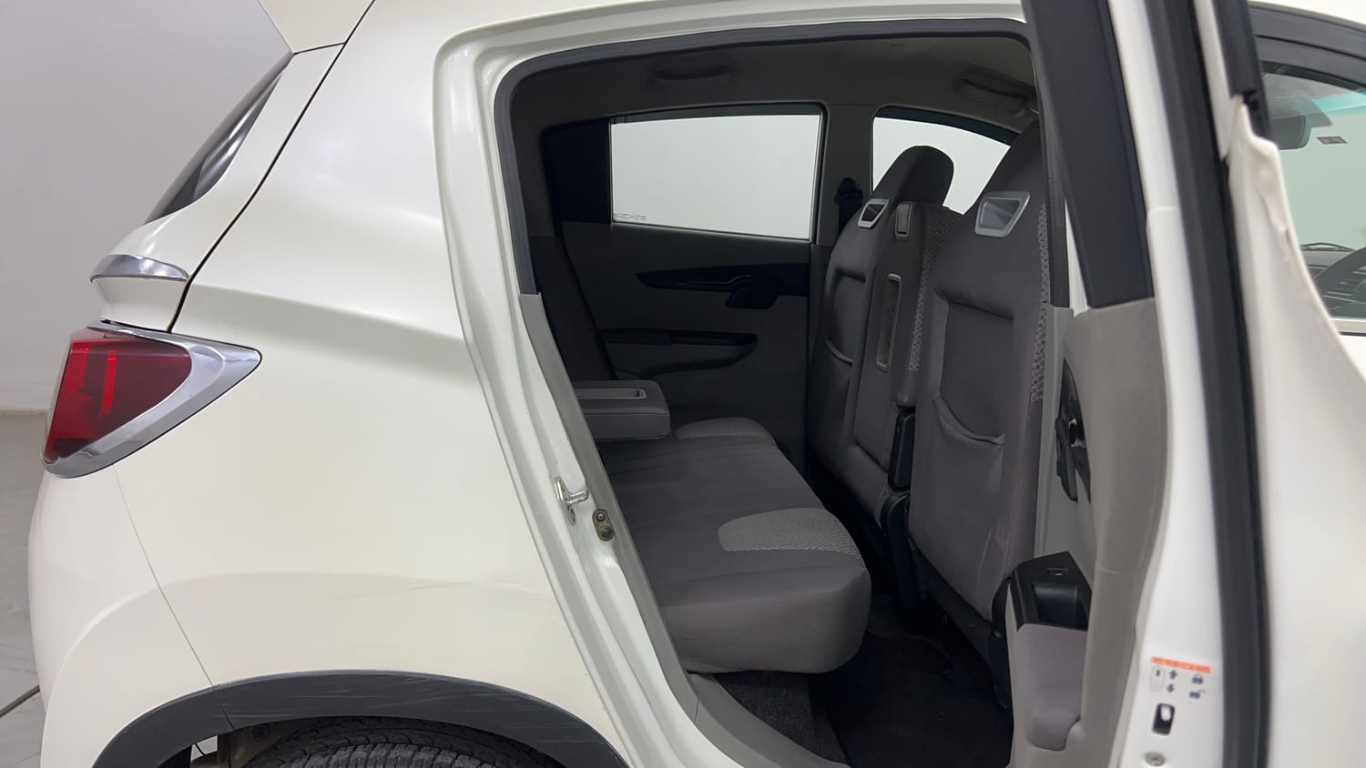Used 2017 Mahindra KUV100 K8 6 STR Petrol Manual interior RIGHT SIDE REAR DOOR CABIN VIEW