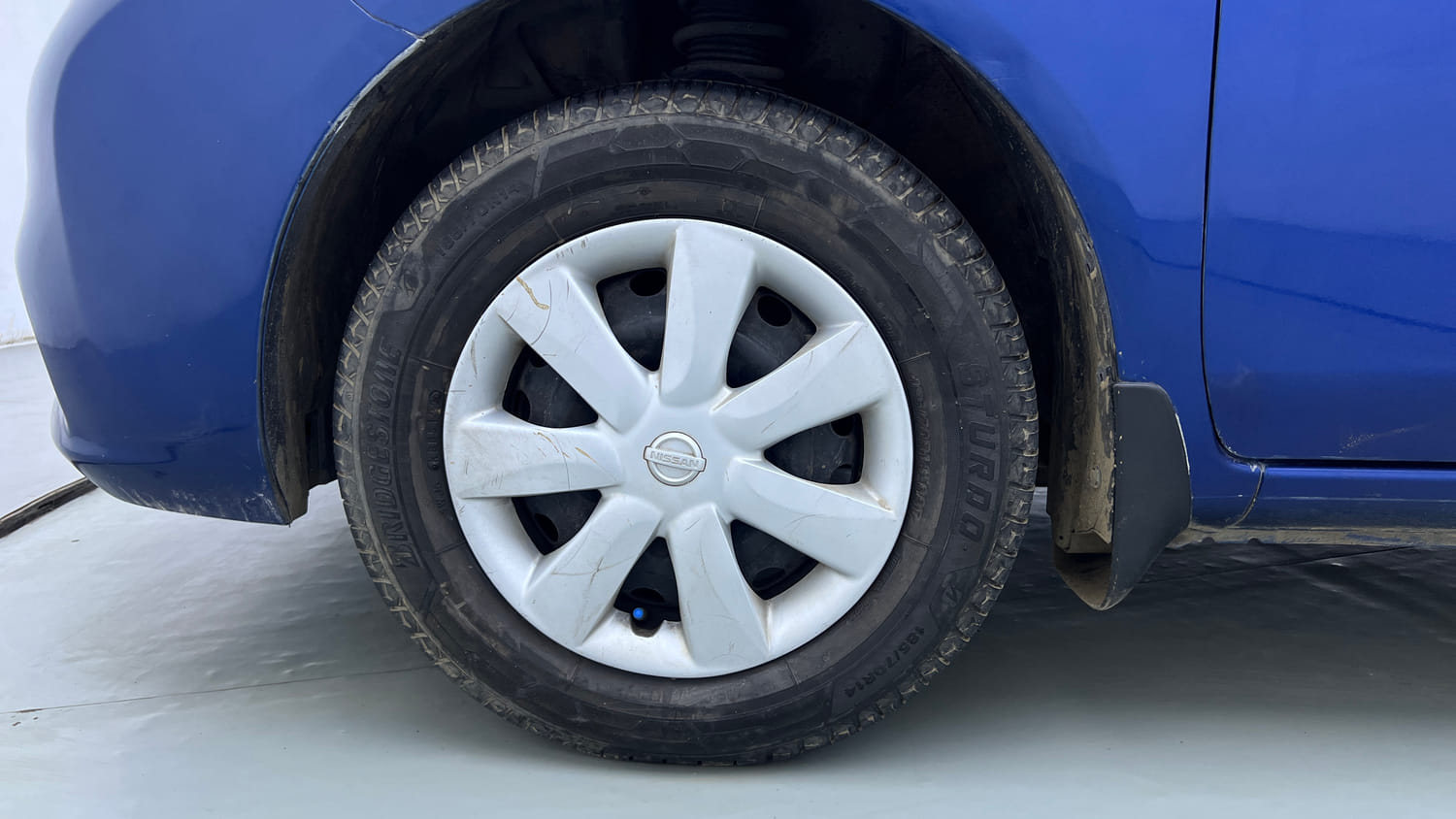 Used 2013 Nissan Sunny XL Petrol Manual tyres LEFT FRONT TYRE RIM VIEW