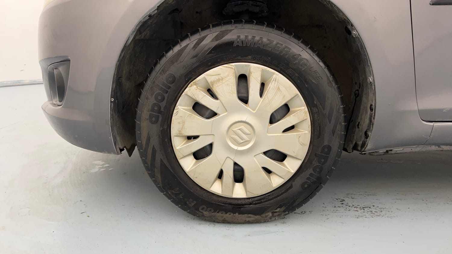 Used 2013 Maruti Suzuki Swift VXi Petrol Manual tyres LEFT FRONT TYRE RIM VIEW
