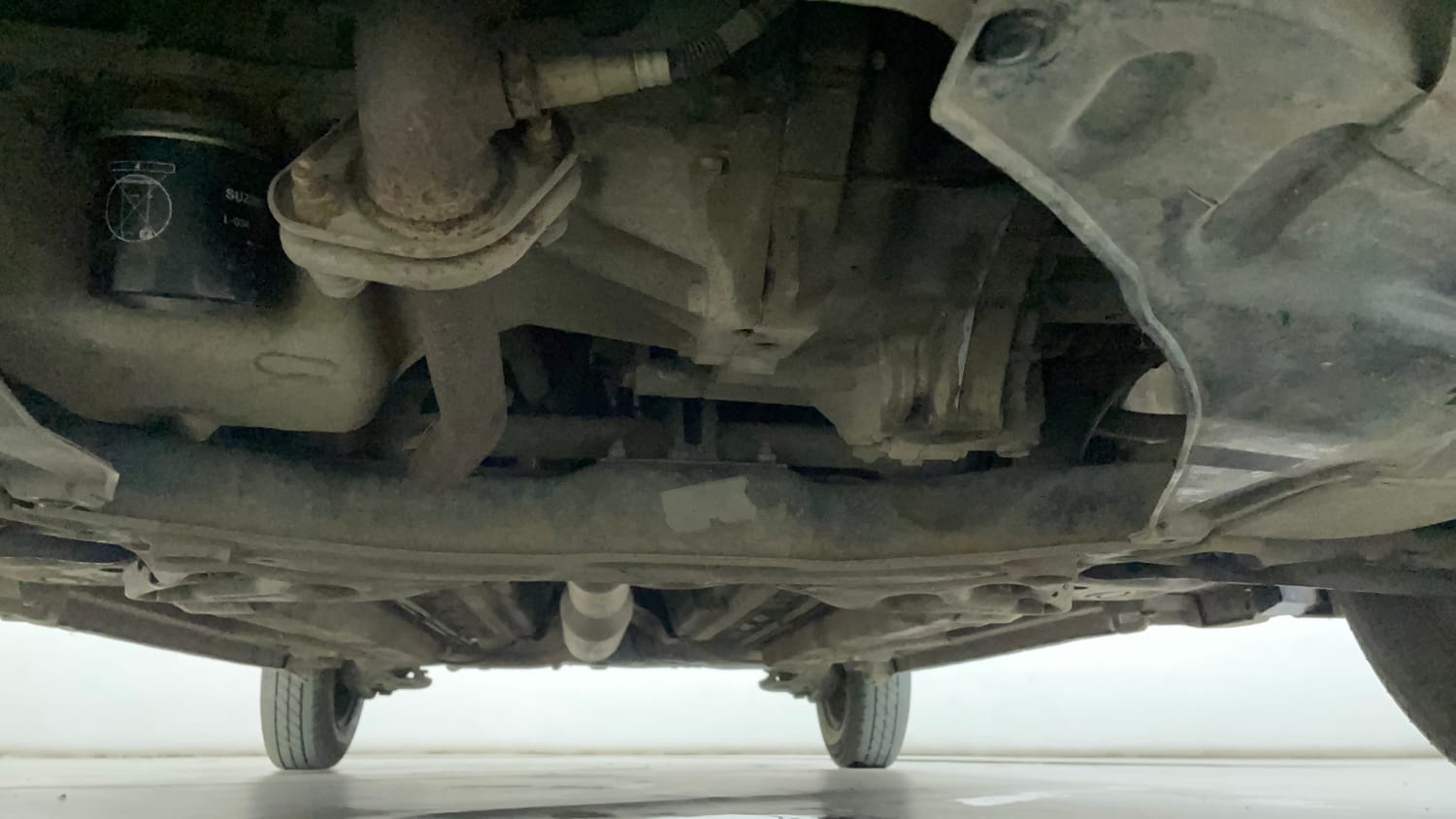 Used 2015 Maruti Suzuki Swift VXi Petrol Manual extra FRONT LEFT UNDERBODY VIEW