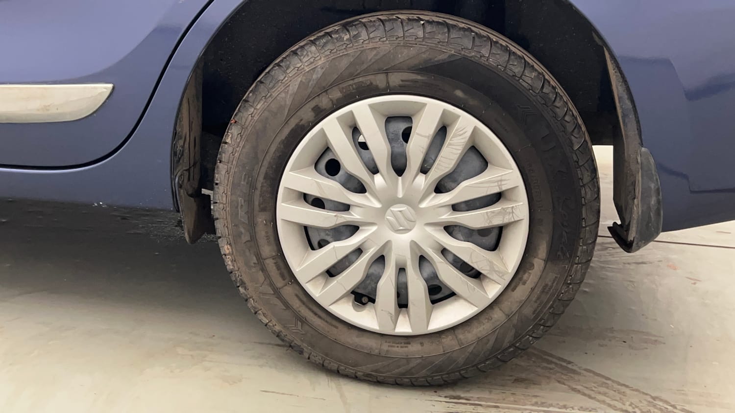 Used 2022 Maruti Suzuki Dzire VXi Petrol Manual tyres LEFT REAR TYRE RIM VIEW
