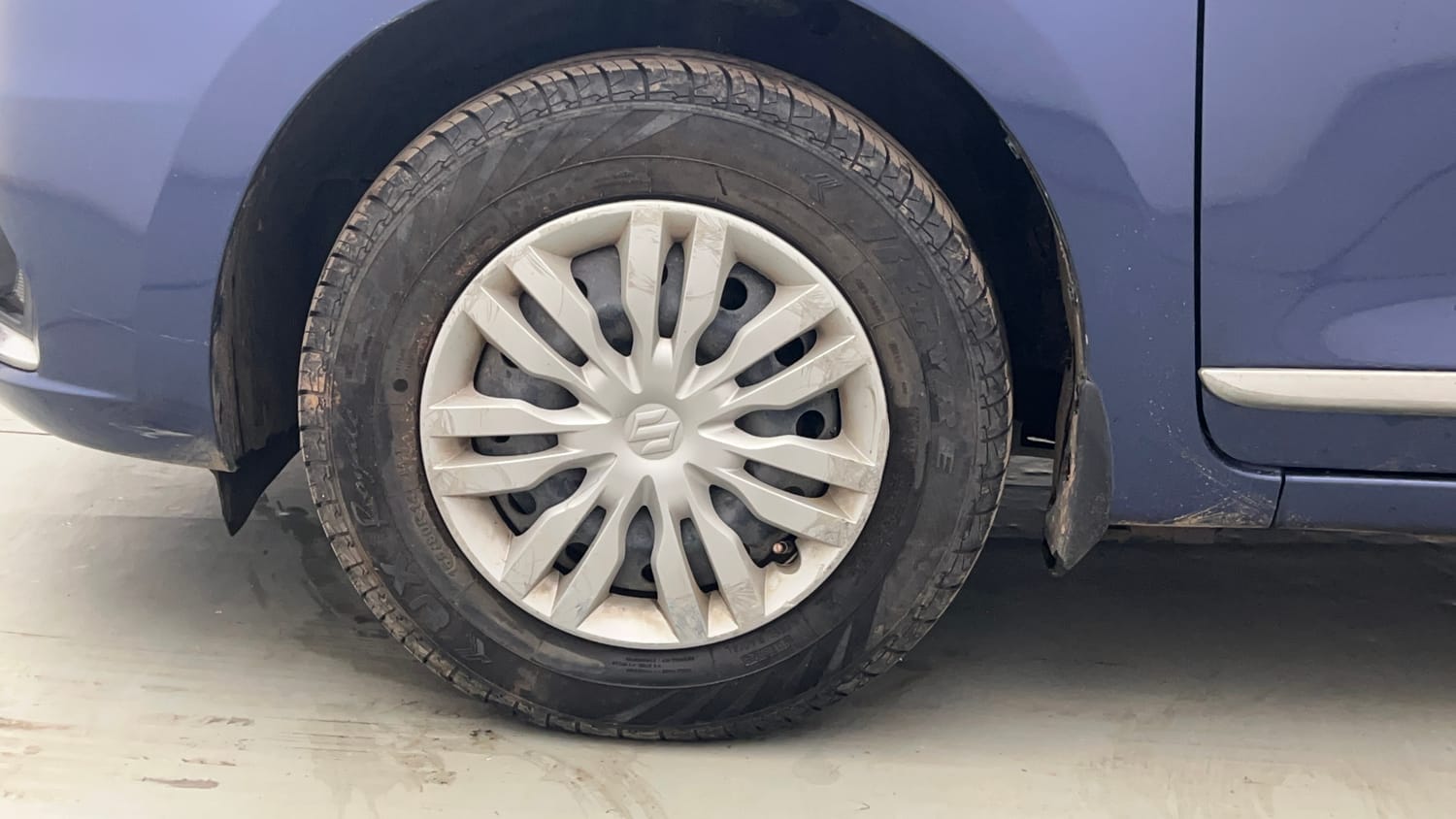 Used 2022 Maruti Suzuki Dzire VXi Petrol Manual tyres LEFT FRONT TYRE RIM VIEW