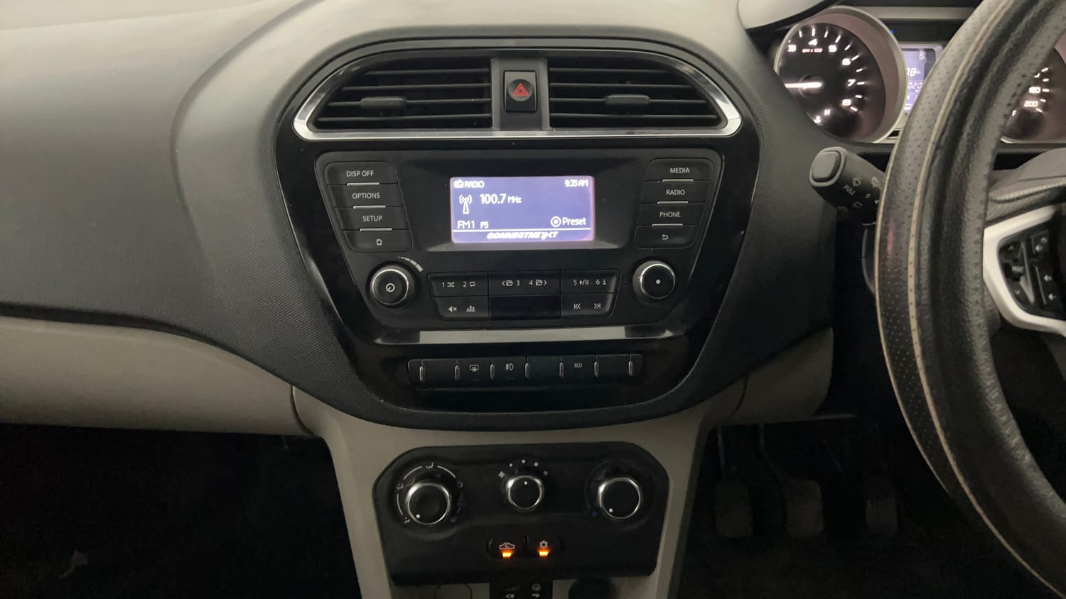 Used 2017 Tata Tiago Revotron XZ Petrol Manual interior MUSIC SYSTEM & AC CONTROL VIEW