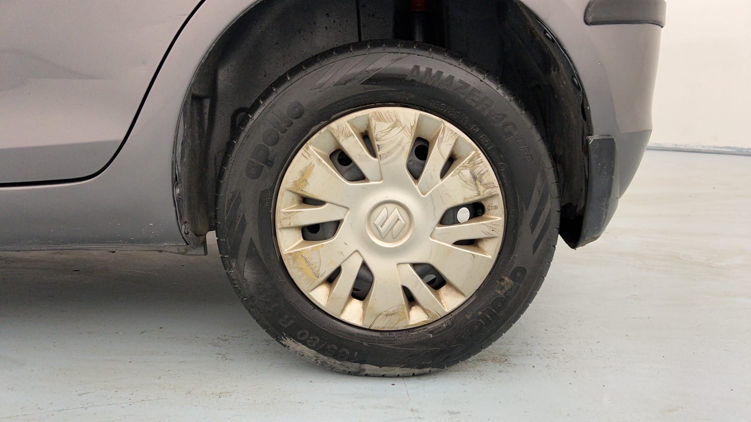 Used 2013 Maruti Suzuki Swift VXi Petrol Manual tyres LEFT REAR TYRE RIM VIEW