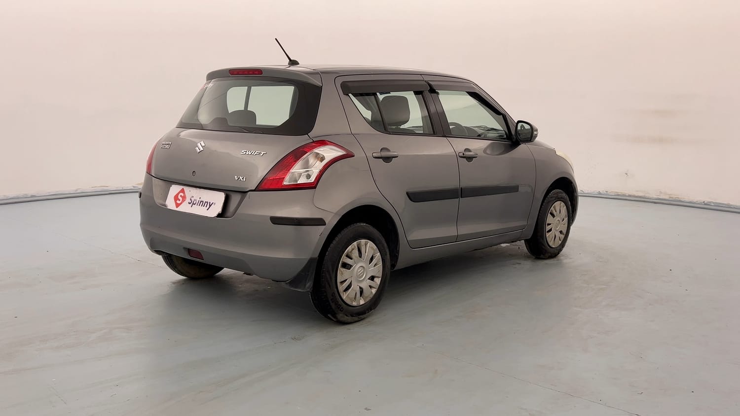 Used 2013 Maruti Suzuki Swift VXi Petrol Manual exterior RIGHT REAR CORNER VIEW
