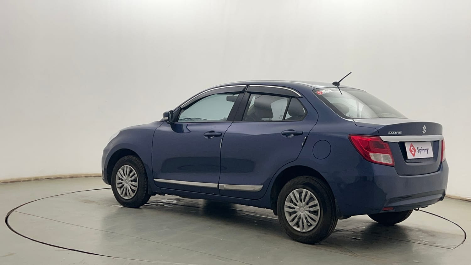 Used 2022 Maruti Suzuki Dzire VXi Petrol Manual exterior LEFT REAR CORNER VIEW