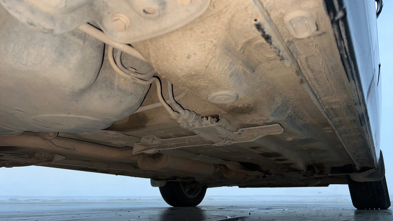 Used 2023 Volkswagen Virtus Highline 1.0 TSI AT Petrol Automatic extra REAR RIGHT UNDERBODY VIEW