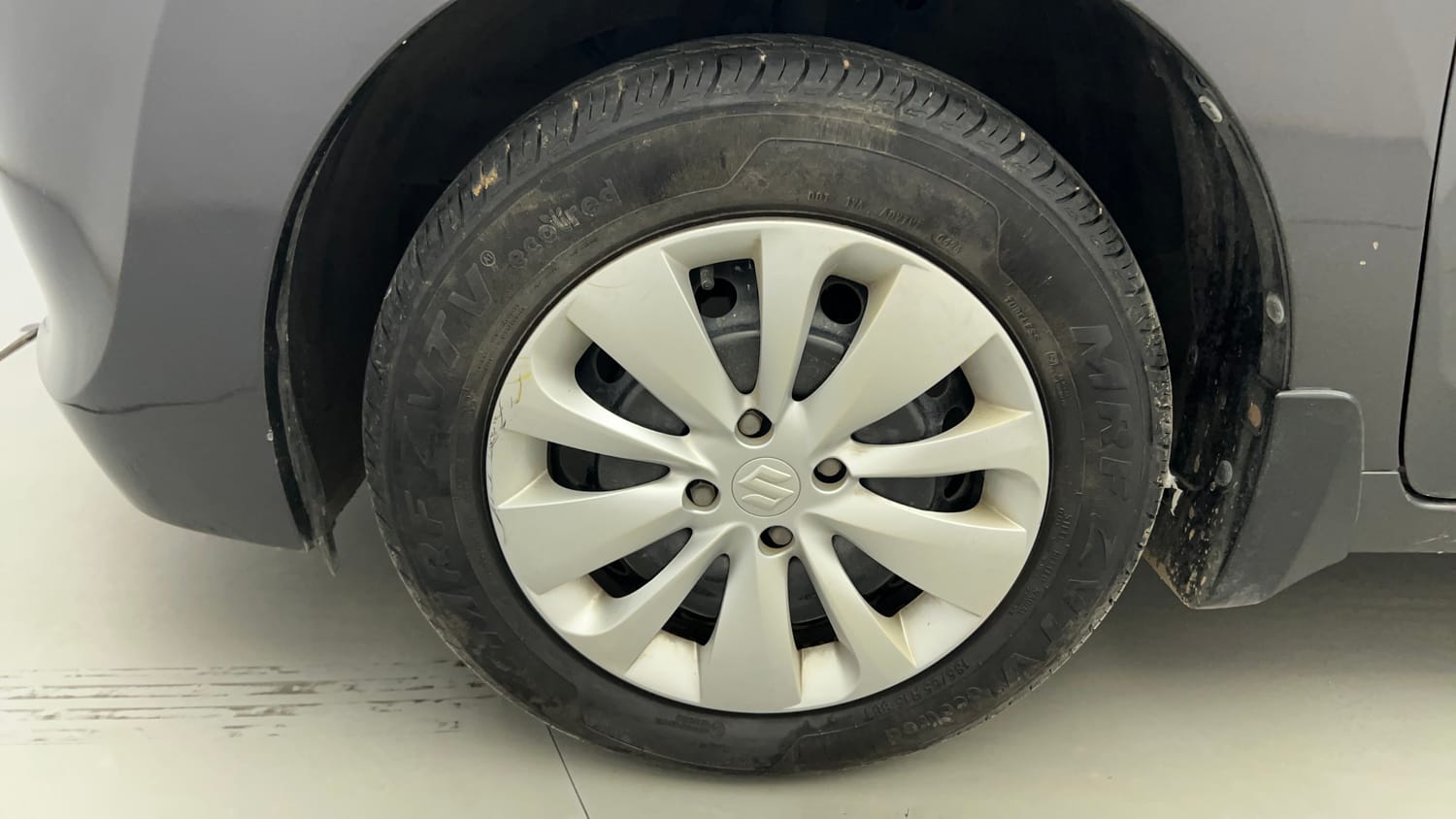 Used 2018 Maruti Suzuki Baleno Delta 1.2 Petrol Manual tyres LEFT FRONT TYRE RIM VIEW