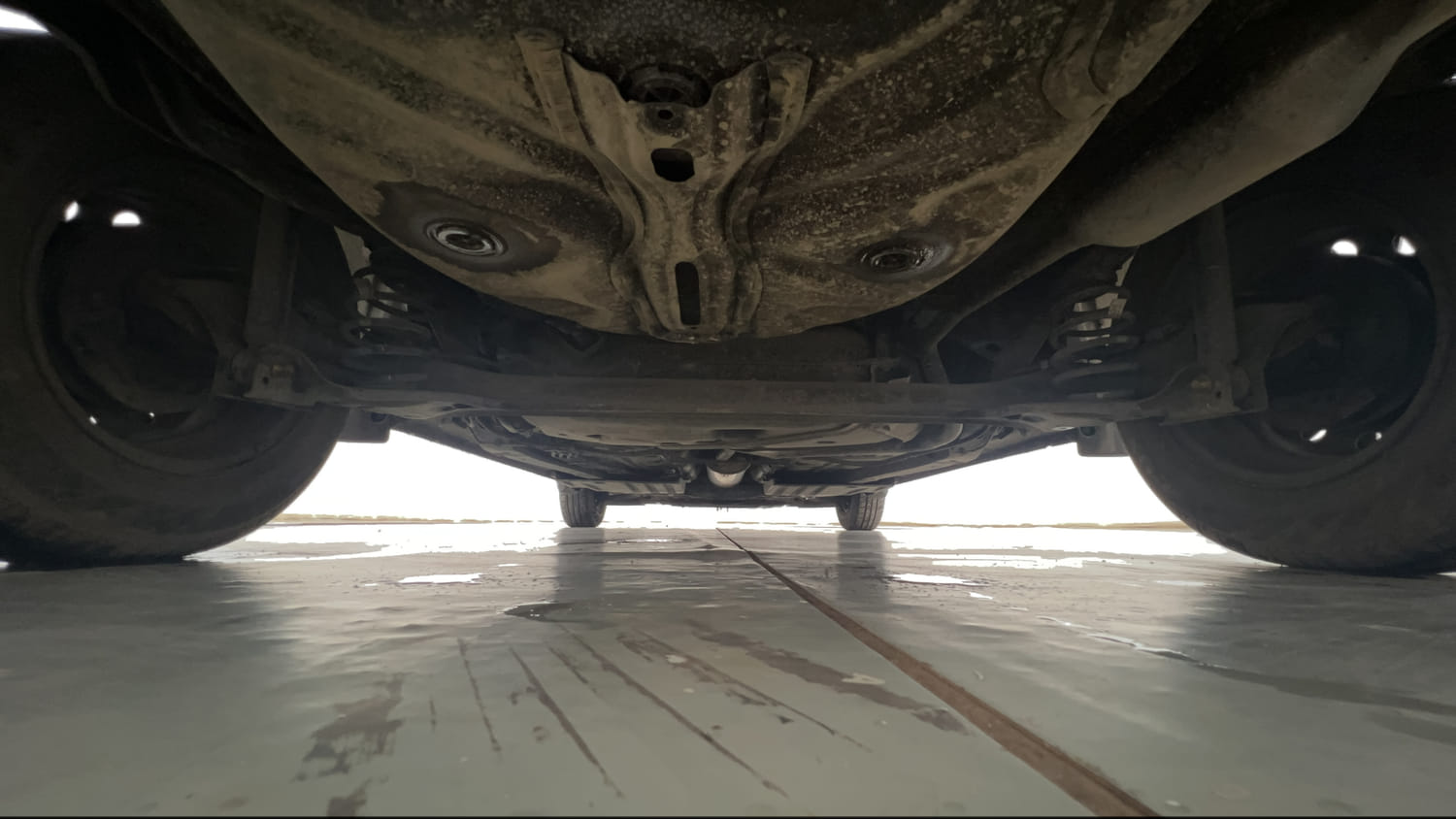Used 2022 Maruti Suzuki Dzire VXi Petrol Manual extra REAR UNDERBODY VIEW (TAKEN FROM REAR)