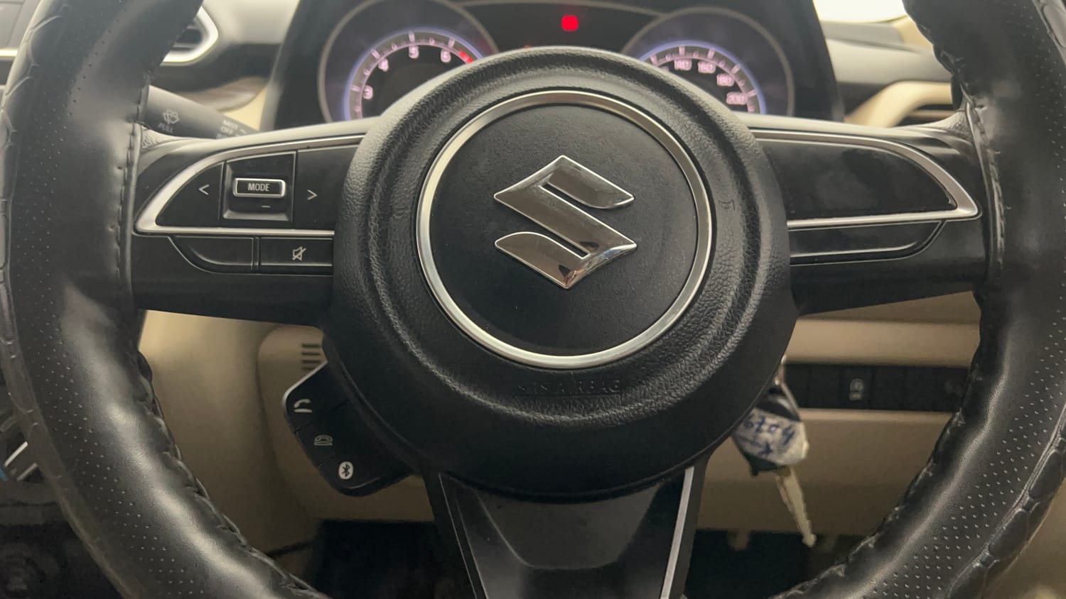 Used 2022 Maruti Suzuki Dzire VXi Petrol Manual top_features Steering mounted controls