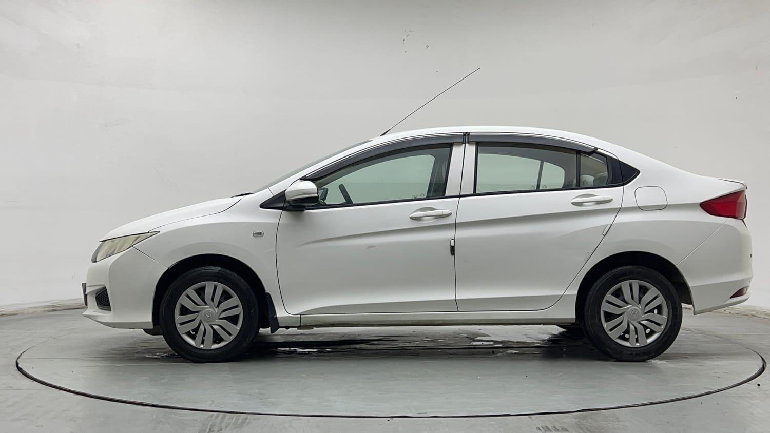 Used 2016 Honda City SV Petrol Manual exterior LEFT SIDE VIEW