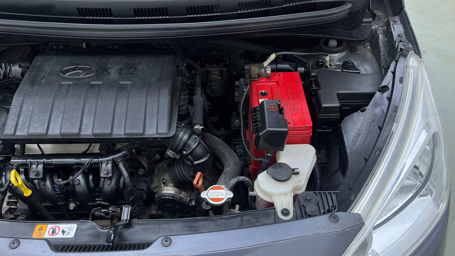 Used 2018 Hyundai Grand i10 Sportz AT 1.2 Kappa VTVT Petrol Automatic engine ENGINE LEFT SIDE VIEW