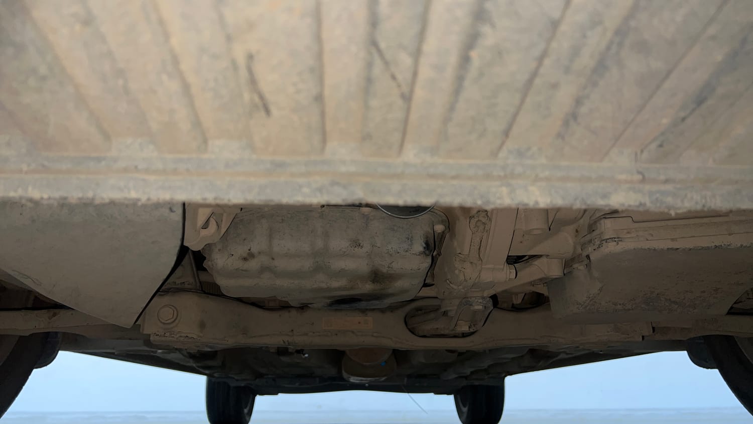 Used 2023 Volkswagen Virtus Highline 1.0 TSI AT Petrol Automatic extra FRONT LEFT UNDERBODY VIEW