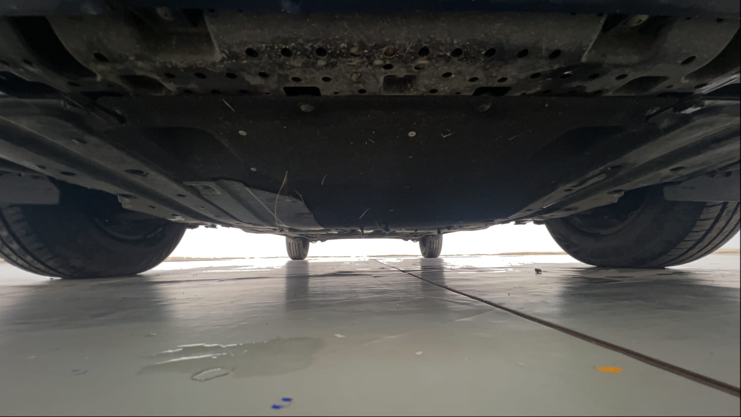Used 2022 Maruti Suzuki Dzire VXi Petrol Manual extra FRONT LEFT UNDERBODY VIEW