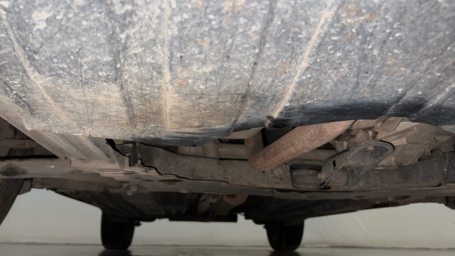 Used 2022 Maruti Suzuki Brezza ZXi Plus Petrol Manual extra FRONT LEFT UNDERBODY VIEW