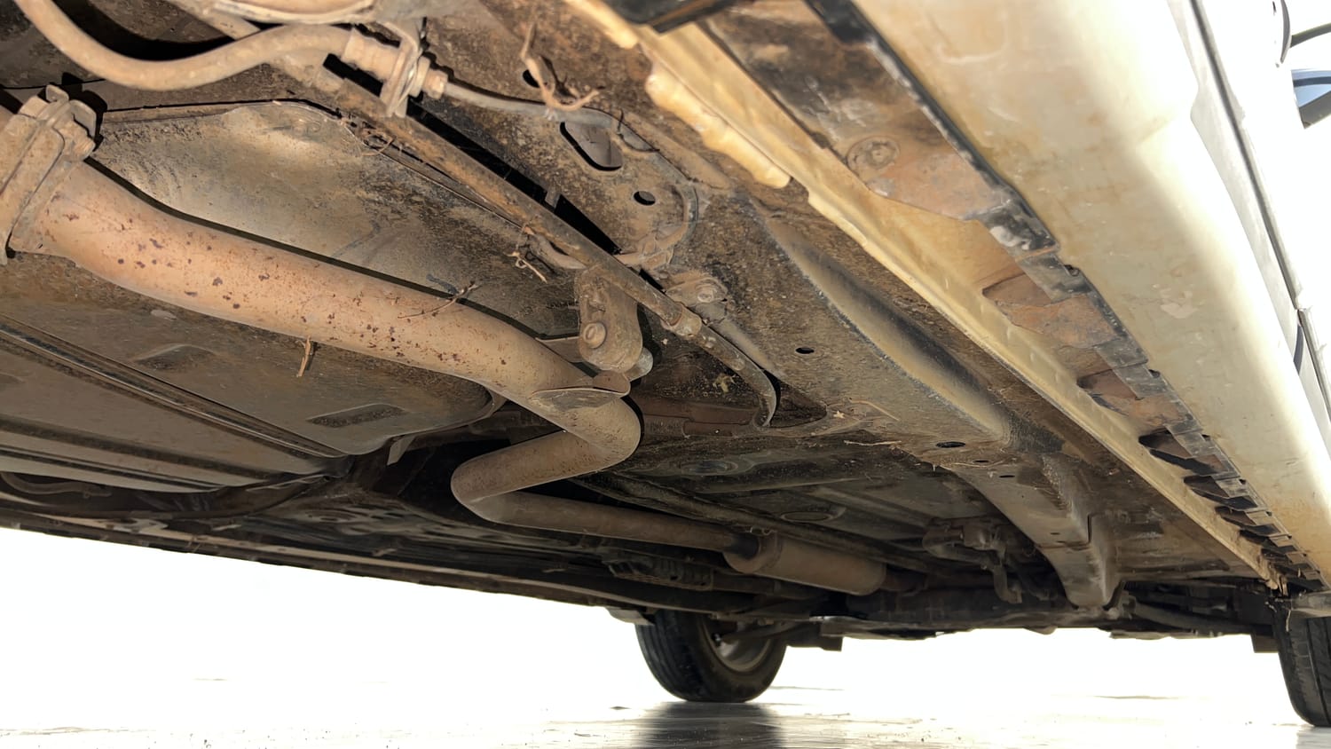 Used 2023 Maruti Suzuki XL6 Alpha Plus MT Petrol Petrol Manual extra REAR RIGHT UNDERBODY VIEW