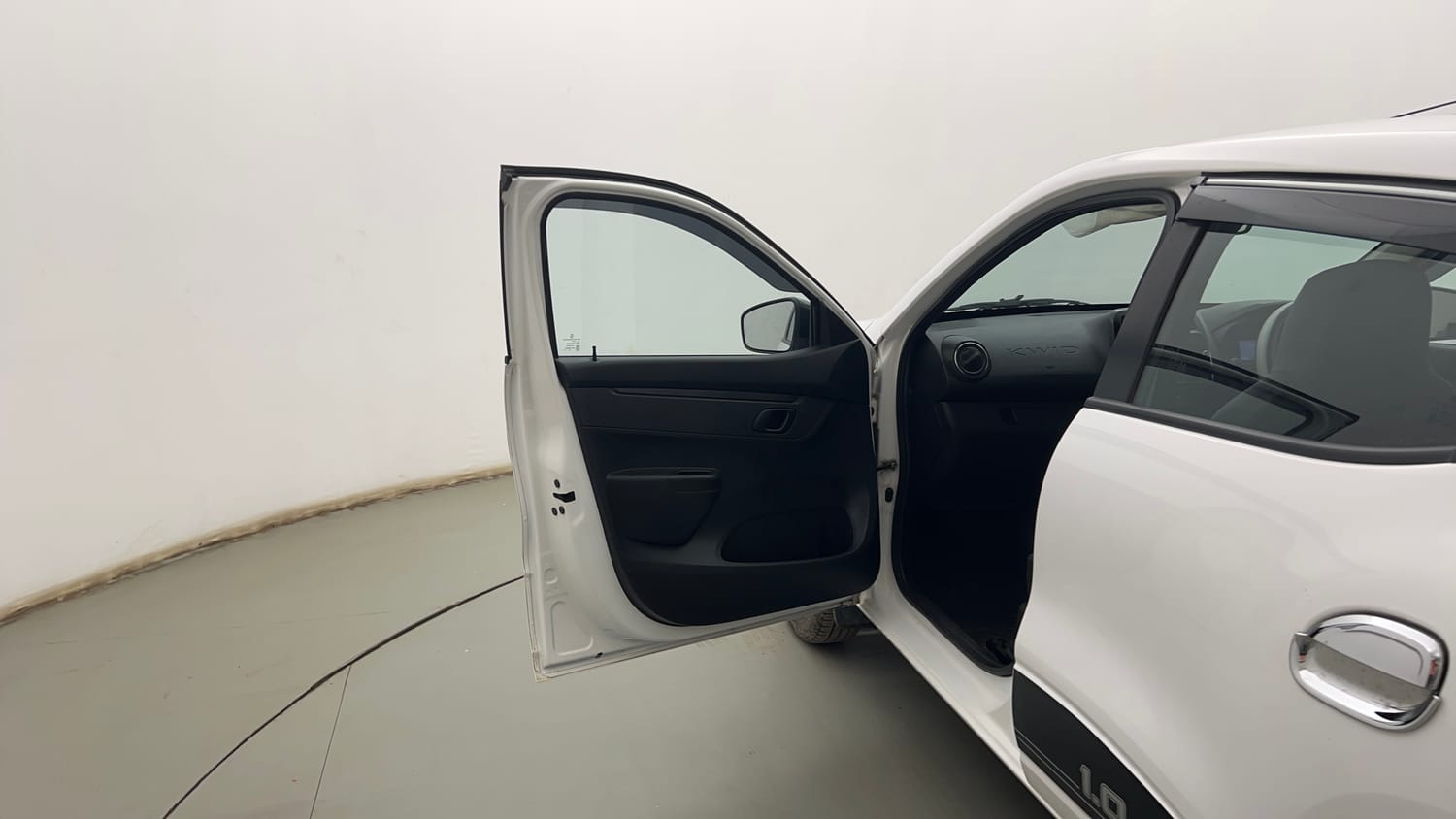 Used 2024 Renault Kwid RXT 1.0L Petrol Manual interior LEFT FRONT DOOR OPEN VIEW