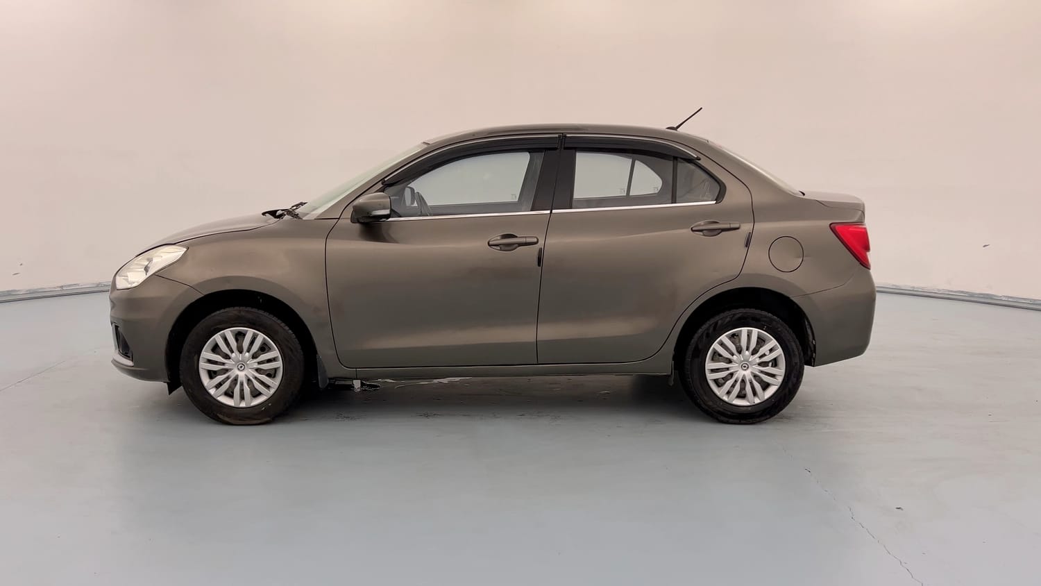 Used 2020 Maruti Suzuki Dzire VXi Petrol Manual exterior LEFT SIDE VIEW