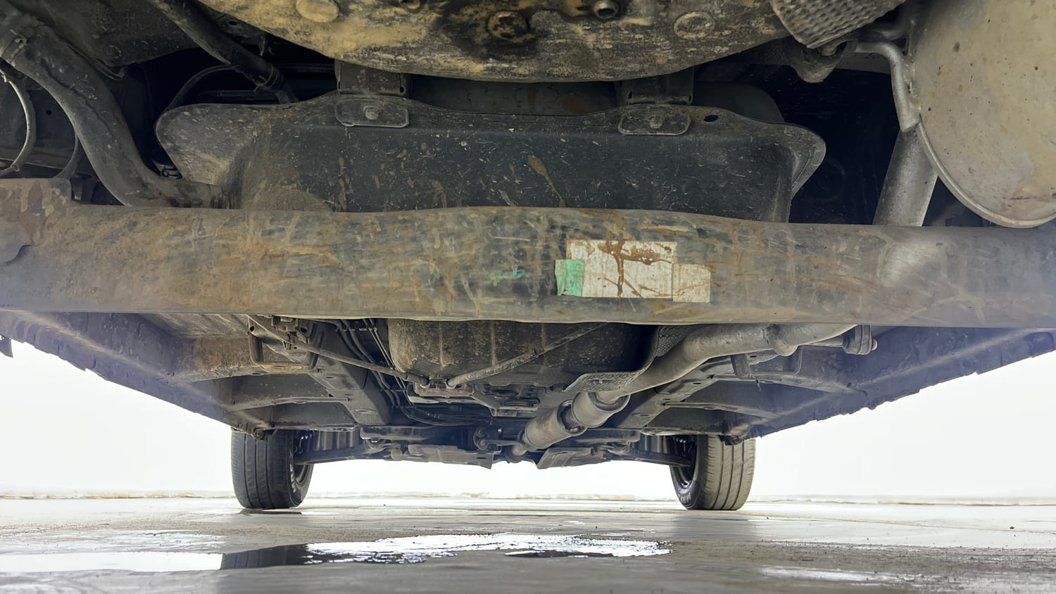 Used 2021 Mahindra KUV100 NXT K2 Plus 6 STR Petrol Manual extra REAR UNDERBODY VIEW (TAKEN FROM REAR)