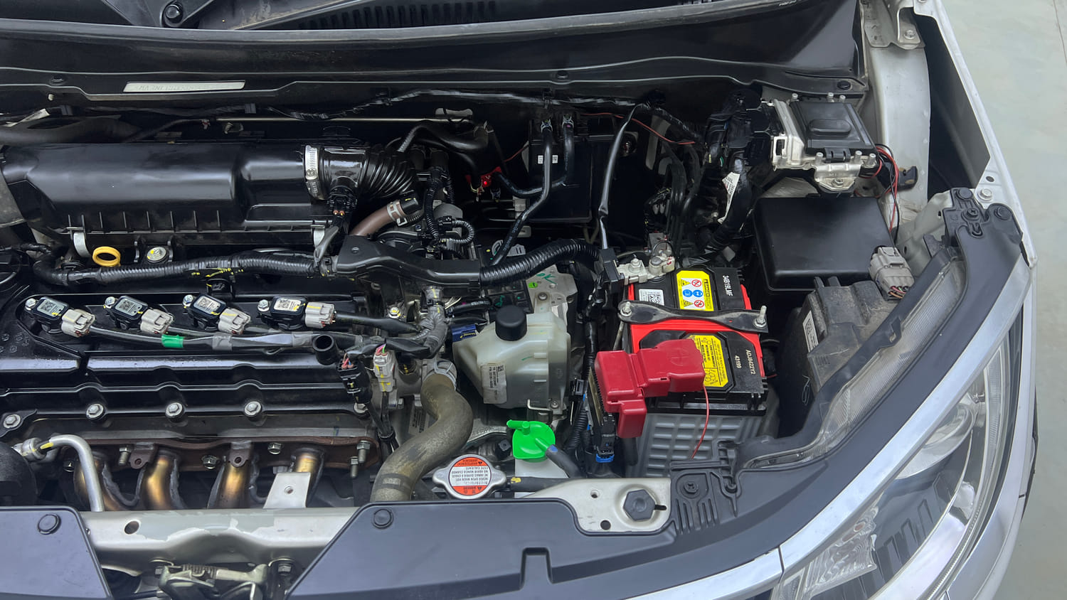 Used 2024 Maruti Suzuki Ignis Alpha 1.2 AMT Petrol Automatic engine ENGINE LEFT SIDE VIEW