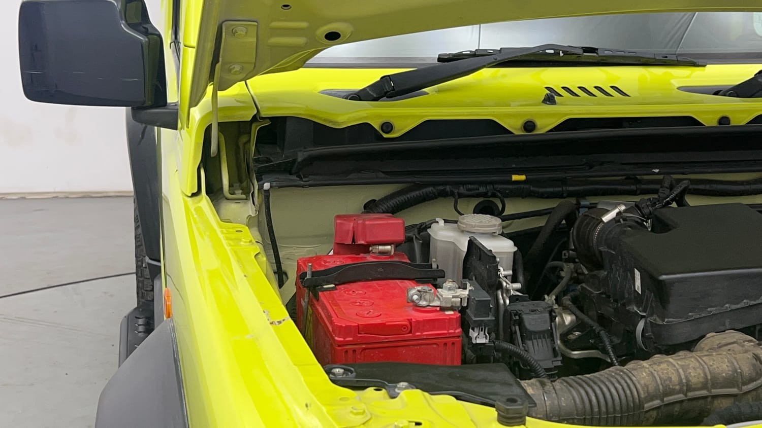 Used 2023 Maruti Suzuki Jimny Alpha AT Petrol Automatic engine ENGINE RIGHT SIDE HINGE & APRON VIEW