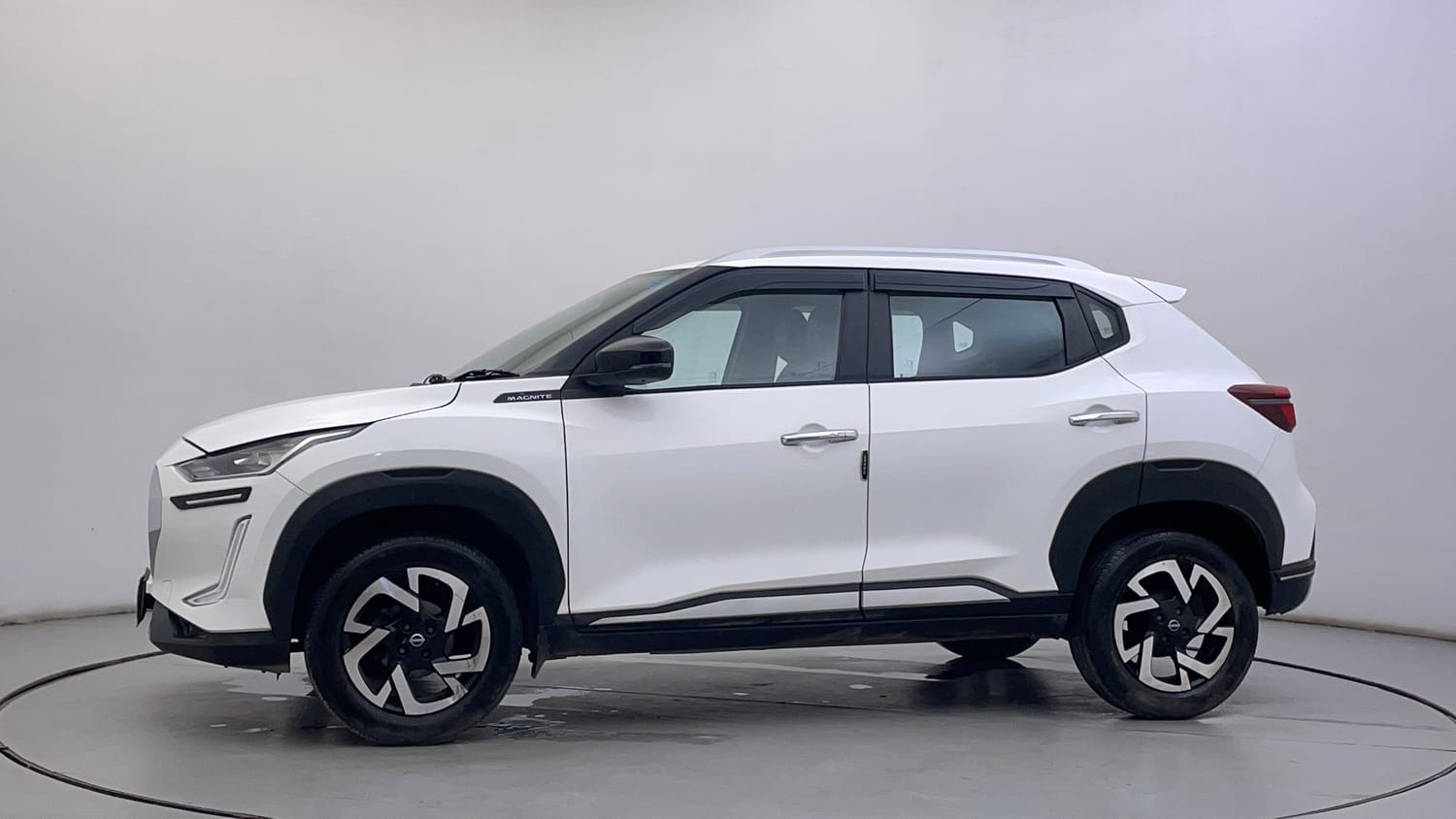 Used 2023 Nissan Magnite XV Petrol Manual exterior LEFT SIDE VIEW