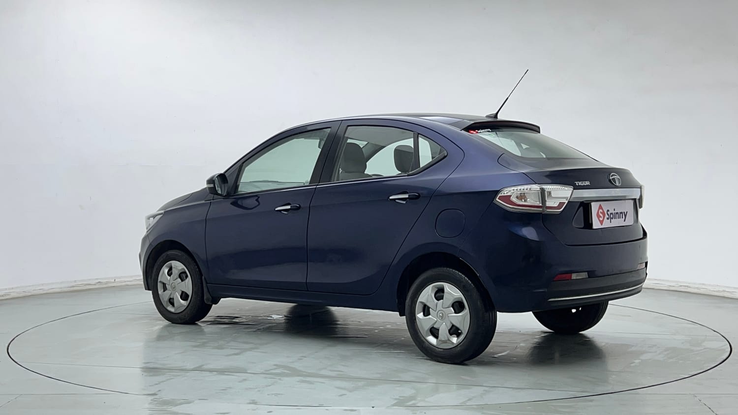 Used 2021 Tata Tigor XZ Petrol Manual exterior LEFT REAR CORNER VIEW