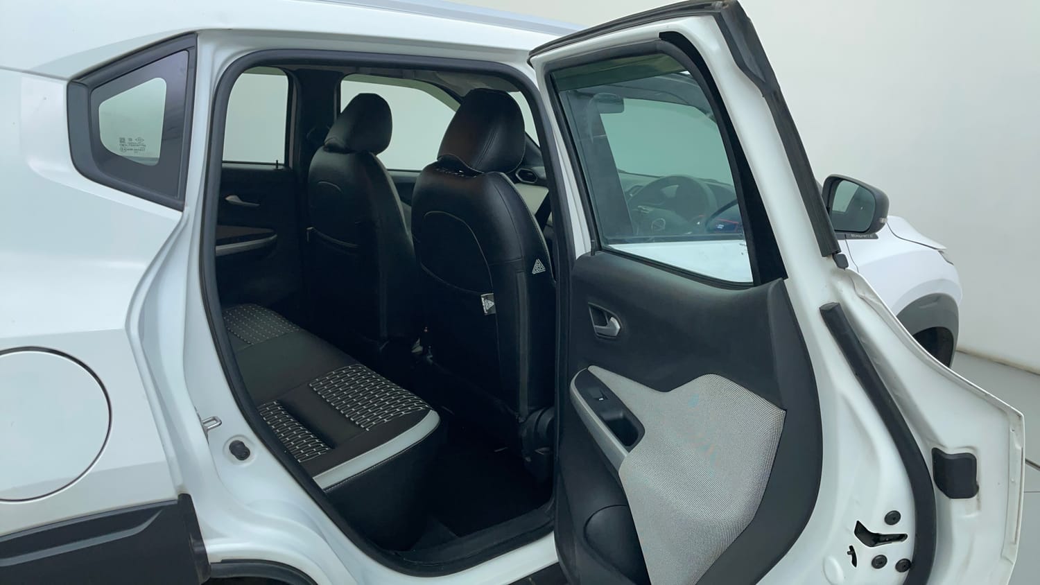 Used 2023 Nissan Magnite XV Petrol Manual interior RIGHT SIDE REAR DOOR CABIN VIEW